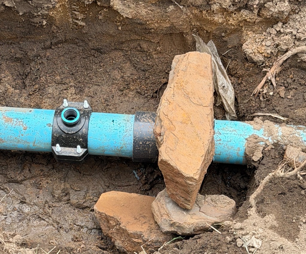 Site photo — pipe fitting in trench